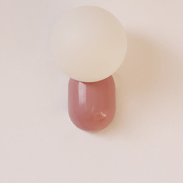 Macaron Cream Resin Glass Ball 1-Light Wall Sconce Lamp 

Illuminate your space with this stylish macaron cream wall sconce featuring a delightful resin glass ball design. Perfect for modern interiors, this 1-light lamp adds a touch of elegance to living