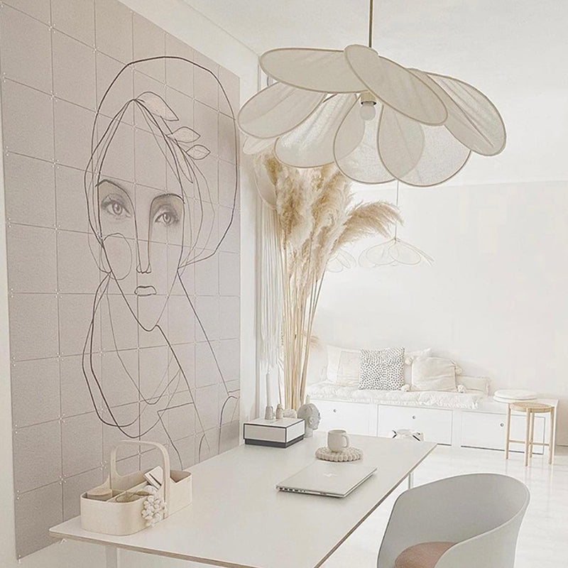 Contemporary Boho Metal Petal Pendant Light for Living Room  

Illuminate your living space with our Contemporary Boho Petal Fabric Metal Lampshade Pendant Light. This stylish 1-light fixture is perfect for adding a touch of bohemian flair to your decor.