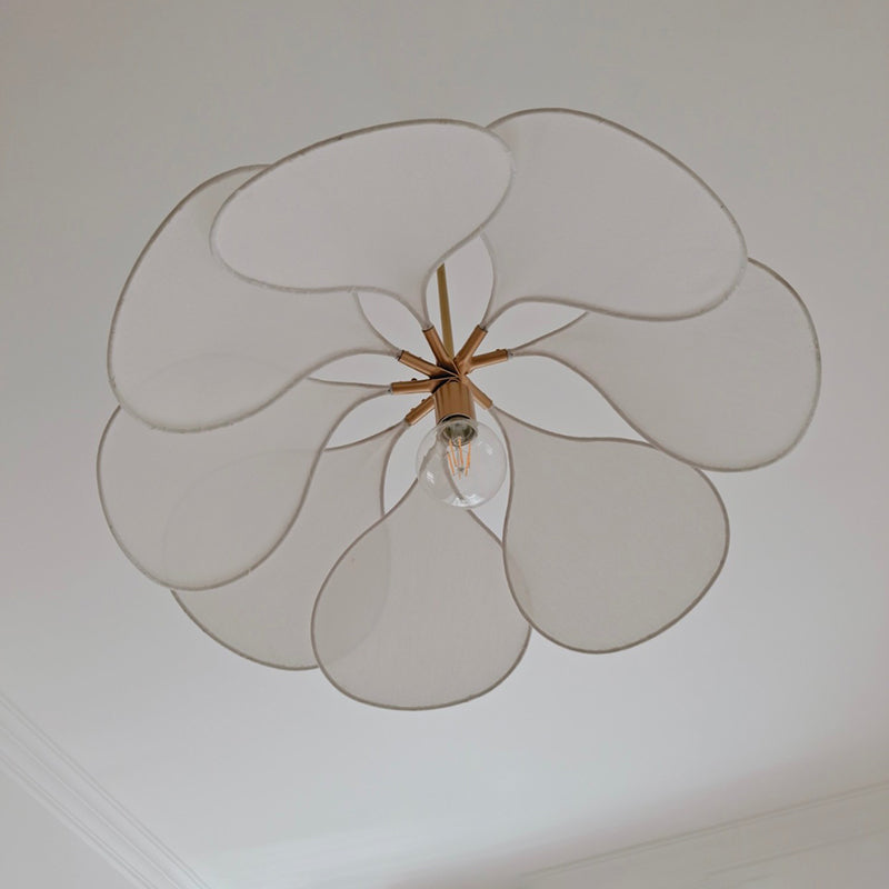 Contemporary Boho Metal Petal Pendant Light for Living Room  

Illuminate your living space with our Contemporary Boho Petal Fabric Metal Lampshade Pendant Light. This stylish 1-light fixture is perfect for adding a touch of bohemian flair to your decor.