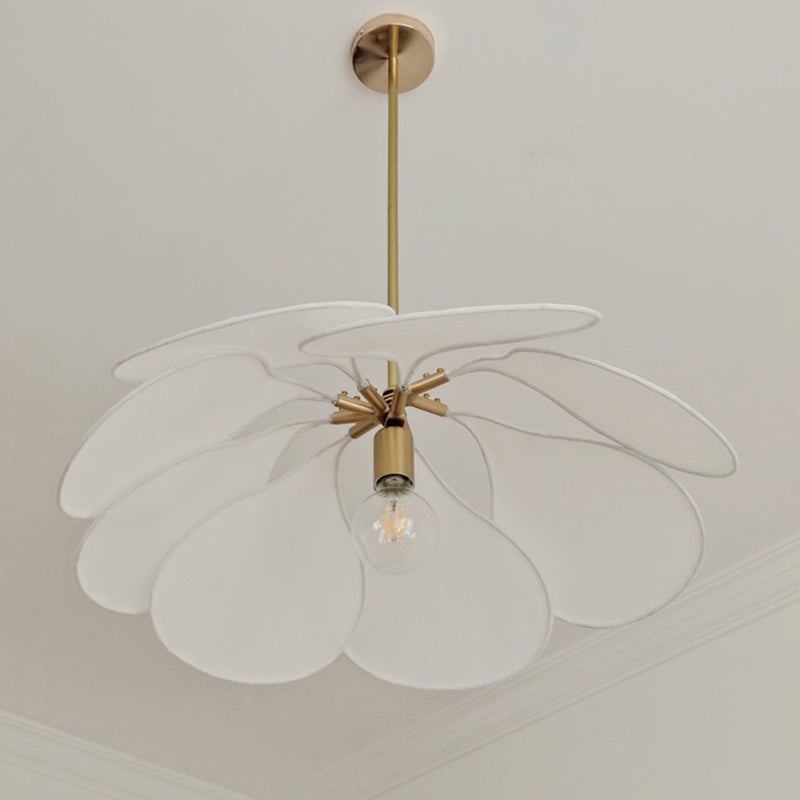 Contemporary Boho Metal Petal Pendant Light for Living Room  

Illuminate your living space with our Contemporary Boho Petal Fabric Metal Lampshade Pendant Light. This stylish 1-light fixture is perfect for adding a touch of bohemian flair to your decor.