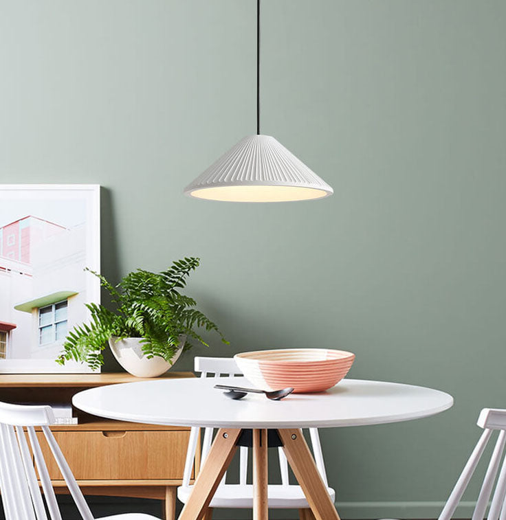 Nordic Resin Pendant Light - Textured Umbrella Design 

Illuminate your space with our Nordic Resin 1-Light Pendant Light featuring a unique textured umbrella design. Perfect for modern interiors, this stylish lighting fixture adds a touch of Scandinavian