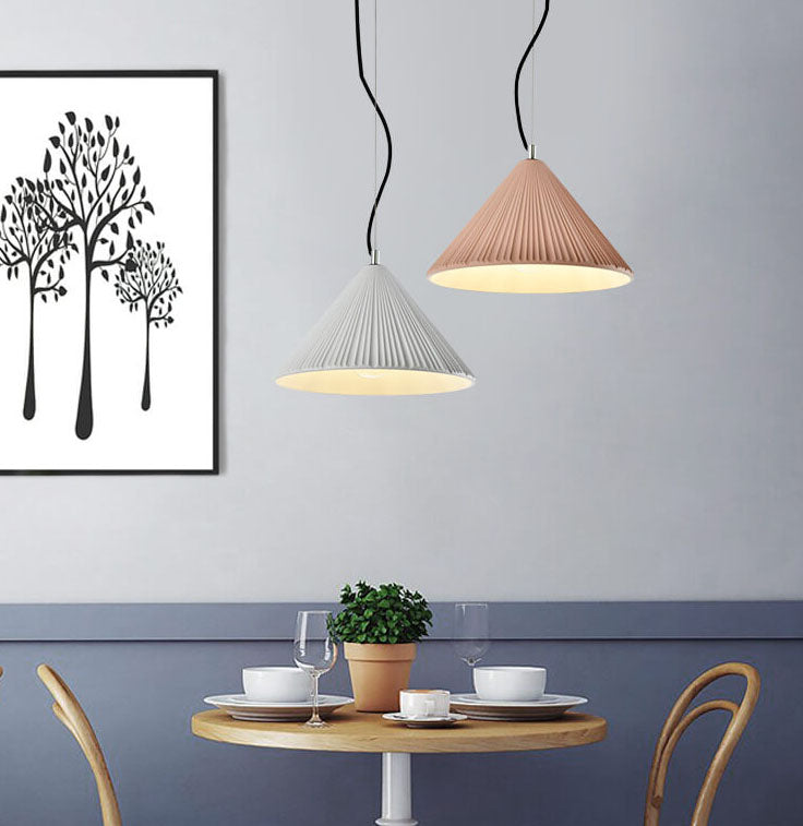 Nordic Resin Pendant Light - Textured Umbrella Design 

Illuminate your space with our Nordic Resin 1-Light Pendant Light featuring a unique textured umbrella design. Perfect for modern interiors, this stylish lighting fixture adds a touch of Scandinavian