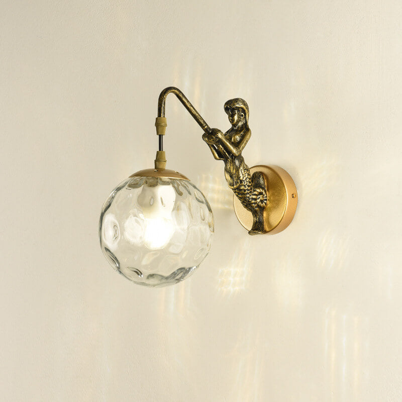 Vintage Rustic Mermaid Wall Sconce Lamp - 1-Light Decor for Coastal Home  

Illuminate your space with this enchanting Vintage Rustic Mermaid Orb 1-Light Wall Sconce Lamp. Perfect for coastal-themed decor, this wall sconce features a charming mermaid desi
