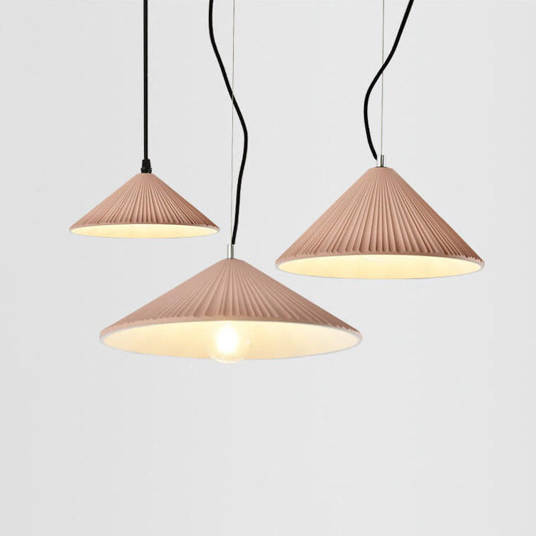 Nordic Resin Pendant Light - Textured Umbrella Design 

Illuminate your space with our Nordic Resin 1-Light Pendant Light featuring a unique textured umbrella design. Perfect for modern interiors, this stylish lighting fixture adds a touch of Scandinavian
