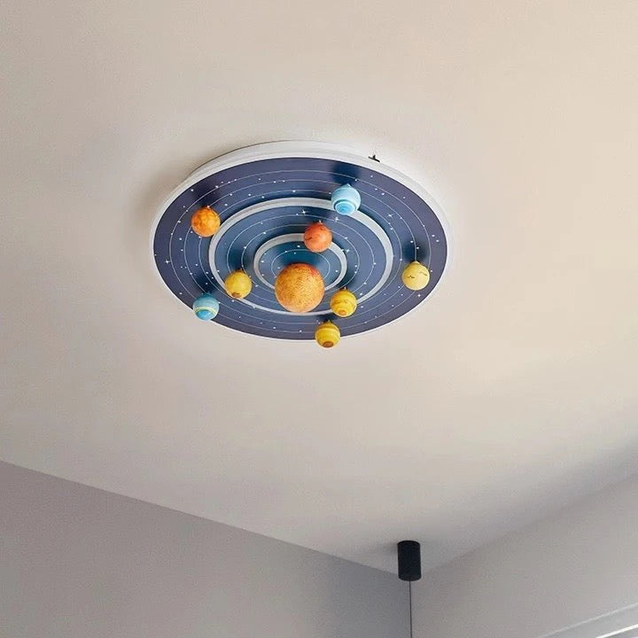 Contemporary Planet Iron LED Ceiling Light for Kids' Room

This stylish and modern flush mount ceiling light features a contemporary round design inspired by space planets. Perfect for children's bedrooms, nurseries, or playrooms, this whimsical fixture a