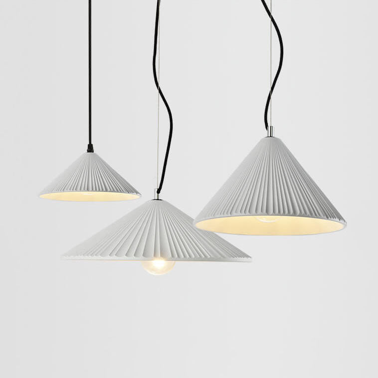 Nordic Resin Pendant Light - Textured Umbrella Design 

Illuminate your space with our Nordic Resin 1-Light Pendant Light featuring a unique textured umbrella design. Perfect for modern interiors, this stylish lighting fixture adds a touch of Scandinavian