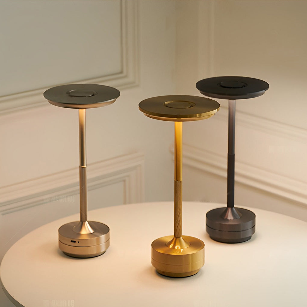 Title: Sleek Metal UFO Alien Table Lamp - Cordless & Modern

Description: Illuminate your space with our Slender Cordless UFO Alien Table Lamp. Featuring a stylish plated metal design, this futuristic lamp is perfect for adding a unique touch to any room.