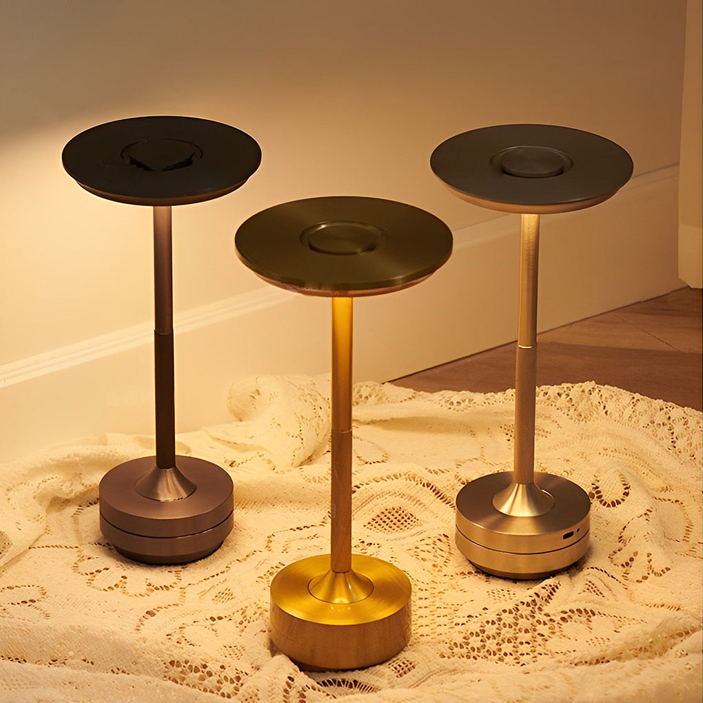 Title: Sleek Metal UFO Alien Table Lamp - Cordless & Modern

Description: Illuminate your space with our Slender Cordless UFO Alien Table Lamp. Featuring a stylish plated metal design, this futuristic lamp is perfect for adding a unique touch to any room.