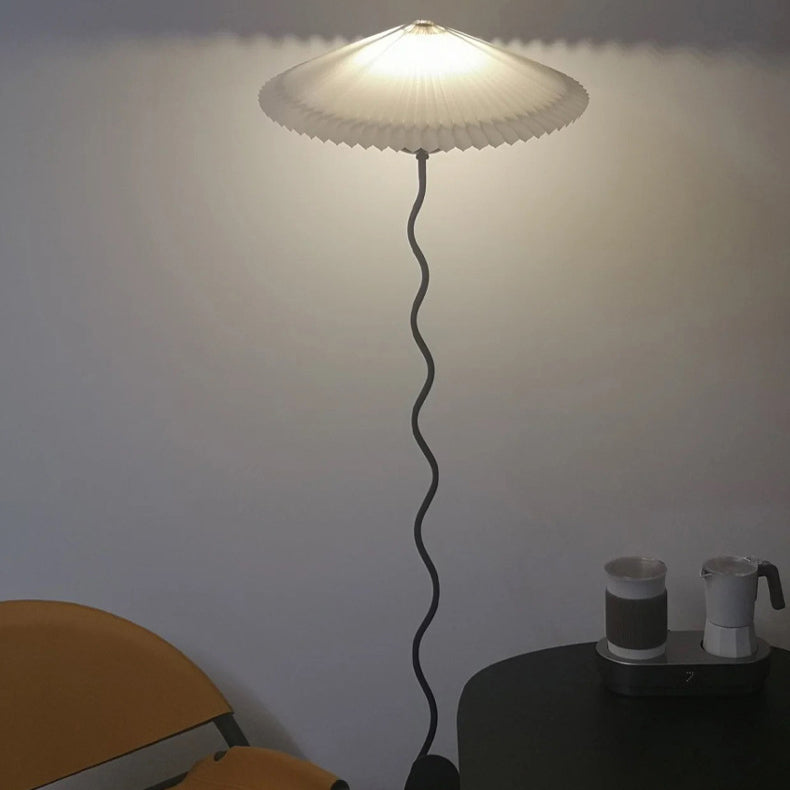 Traditional Japanese Fabric Iron Umbrella Floor Lamp - 1-Light Design for Living Room  

Illuminate your living space with this elegant Traditional Japanese Fabric Iron Umbrella Floor Lamp. Featuring a unique design that combines cultural aesthetics with