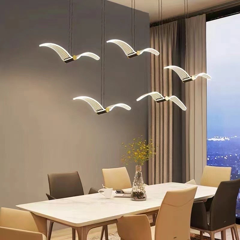 Contemporary Seagull Acrylic LED Pendant Light for Dining Room  

Elevate your dining experience with our Contemporary Seagull Iron Acrylic LED Pendant Light. This modern fixture combines artistic design with energy-efficient LED technology, perfect for a