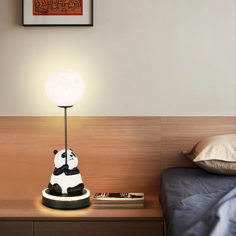 Contemporary Panda PVC Lampshade LED Table Lamp for Bedroom

Illuminate your space with our Contemporary Panda Resin Base PVC Lampshade LED Table Lamp, perfect for adding a touch of whimsy and charm to your bedroom decor. Crafted with high-quality materia