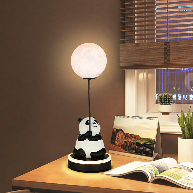 Contemporary Panda PVC Lampshade LED Table Lamp for Bedroom

Illuminate your space with our Contemporary Panda Resin Base PVC Lampshade LED Table Lamp, perfect for adding a touch of whimsy and charm to your bedroom decor. Crafted with high-quality materia