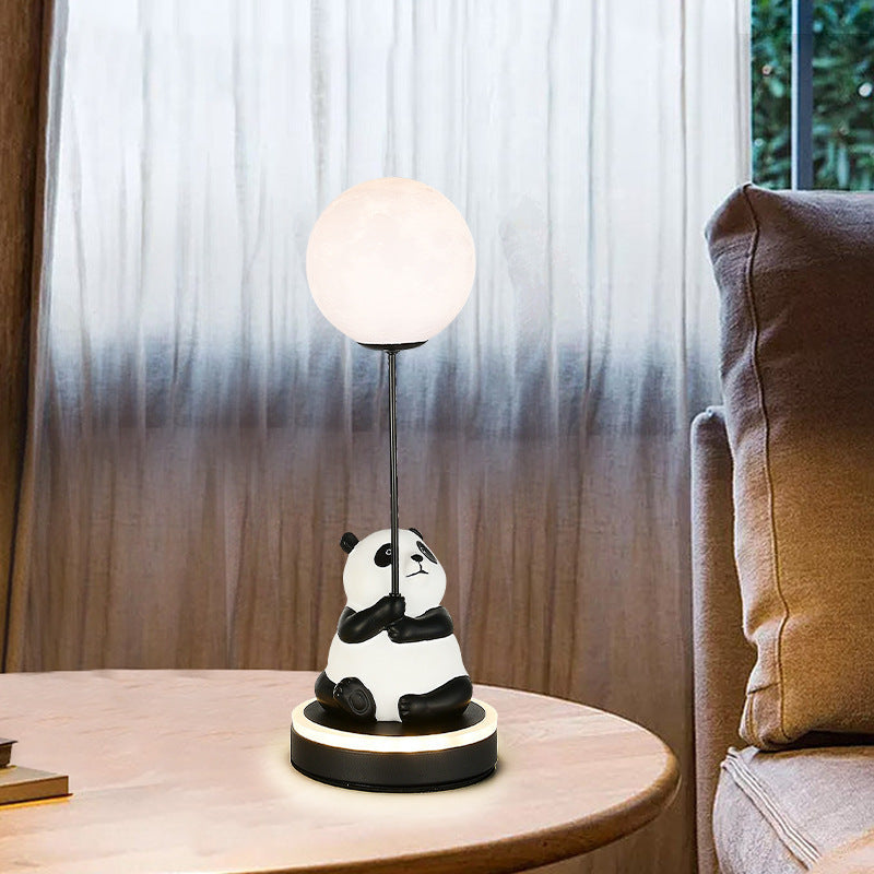Contemporary Panda PVC Lampshade LED Table Lamp for Bedroom

Illuminate your space with our Contemporary Panda Resin Base PVC Lampshade LED Table Lamp, perfect for adding a touch of whimsy and charm to your bedroom decor. Crafted with high-quality materia