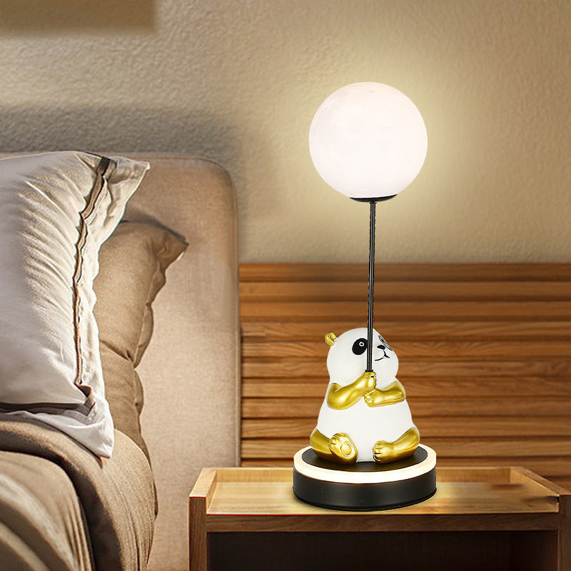Contemporary Panda PVC Lampshade LED Table Lamp for Bedroom

Illuminate your space with our Contemporary Panda Resin Base PVC Lampshade LED Table Lamp, perfect for adding a touch of whimsy and charm to your bedroom decor. Crafted with high-quality materia
