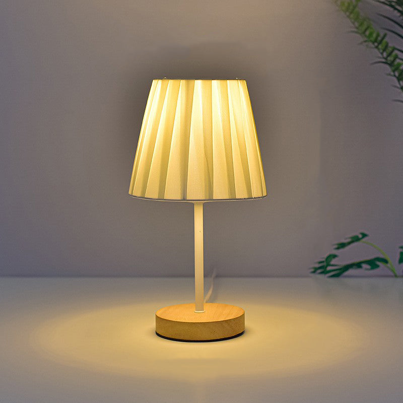 Modern Minimalist Trapezoidal Solid Wood Fabric LED Table Lamp for Bedroom, Contemporary Nightstand Light, Stylish Home Decor, Warm White Lighting, Eco-Friendly Design, Adjustable Brightness, Bedroom Lighting, Scandinavian Style Lamp, Chic Bedroom Accesso
