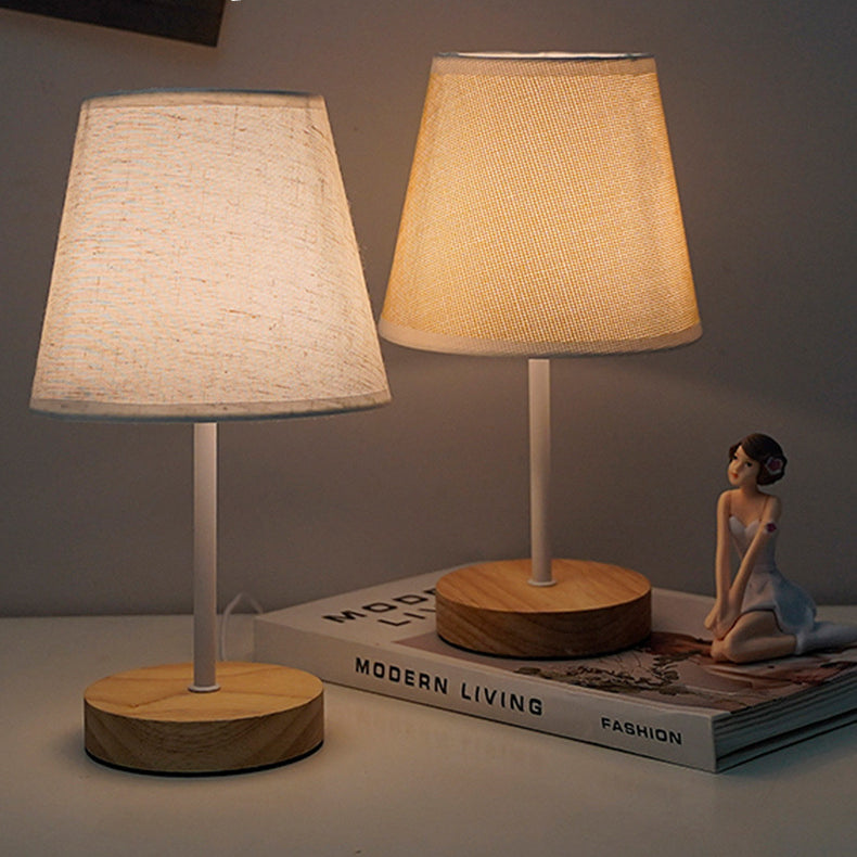 Modern Minimalist Trapezoidal Solid Wood Fabric LED Bedroom Lamp