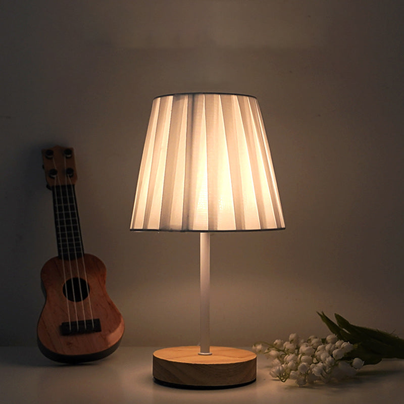 Modern Minimalist Trapezoidal Solid Wood Fabric LED Table Lamp for Bedroom, Contemporary Nightstand Light, Stylish Home Decor, Warm White Lighting, Eco-Friendly Design, Adjustable Brightness, Bedroom Lighting, Scandinavian Style Lamp, Chic Bedroom Accesso
