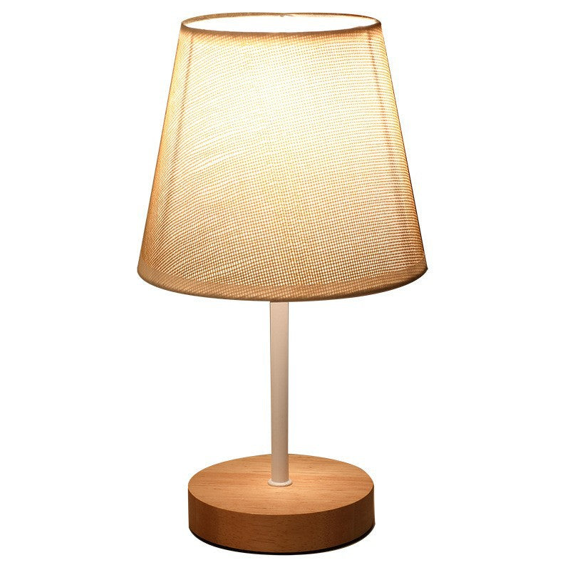 Modern Minimalist Trapezoidal Solid Wood Fabric LED Table Lamp for Bedroom, Contemporary Nightstand Light, Stylish Home Decor, Warm White Lighting, Eco-Friendly Design, Adjustable Brightness, Bedroom Lighting, Scandinavian Style Lamp, Chic Bedroom Accesso