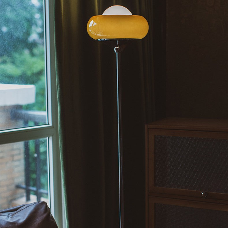 Contemporary Metal & Glass Egg Tart Shape Floor Lamp for Bedroom & Living Room

Illuminate your space with this stylish metal and glass egg tart-shaped floor lamp, perfect for enhancing the aesthetics of modern bedrooms and living rooms. This one-light st