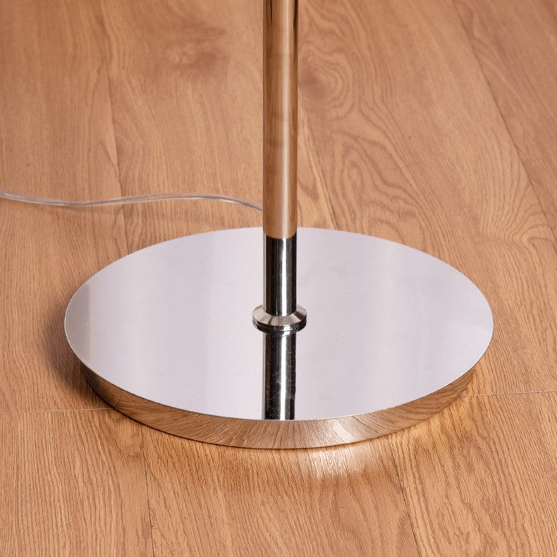 Contemporary Metal & Glass Egg Tart Shape Floor Lamp for Bedroom & Living Room

Illuminate your space with this stylish metal and glass egg tart-shaped floor lamp, perfect for enhancing the aesthetics of modern bedrooms and living rooms. This one-light st