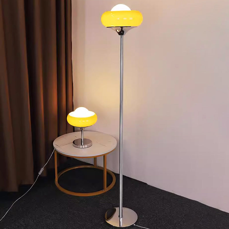 Contemporary Metal & Glass Egg Tart Shape Floor Lamp for Bedroom & Living Room

Illuminate your space with this stylish metal and glass egg tart-shaped floor lamp, perfect for enhancing the aesthetics of modern bedrooms and living rooms. This one-light st