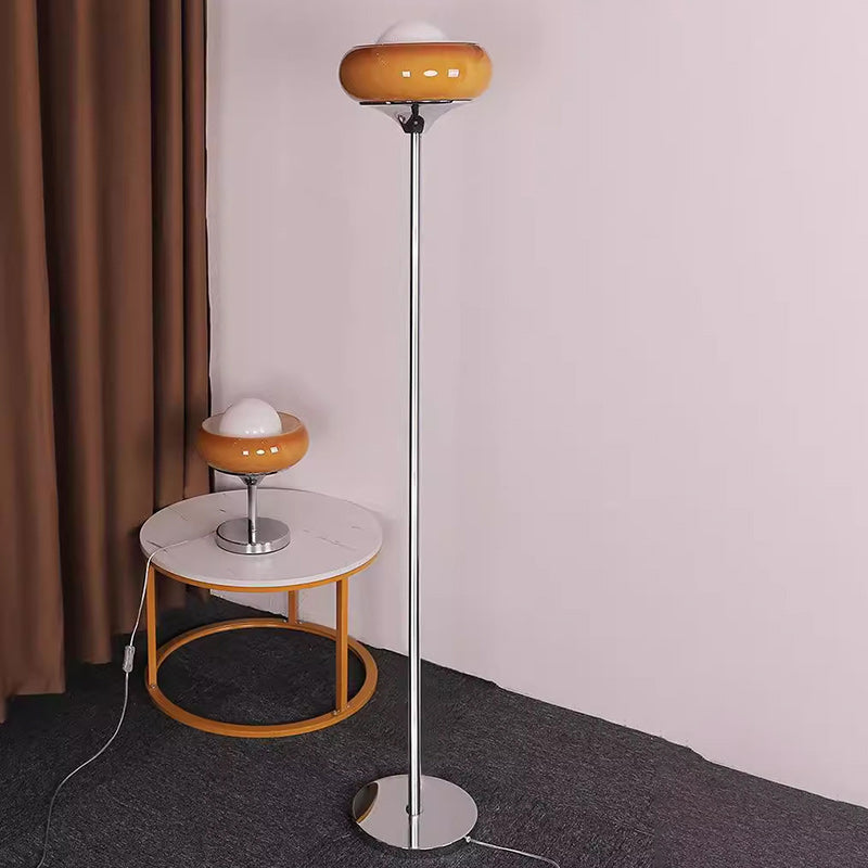 Contemporary Metal & Glass Egg Tart Shape Floor Lamp for Bedroom & Living Room

Illuminate your space with this stylish metal and glass egg tart-shaped floor lamp, perfect for enhancing the aesthetics of modern bedrooms and living rooms. This one-light st