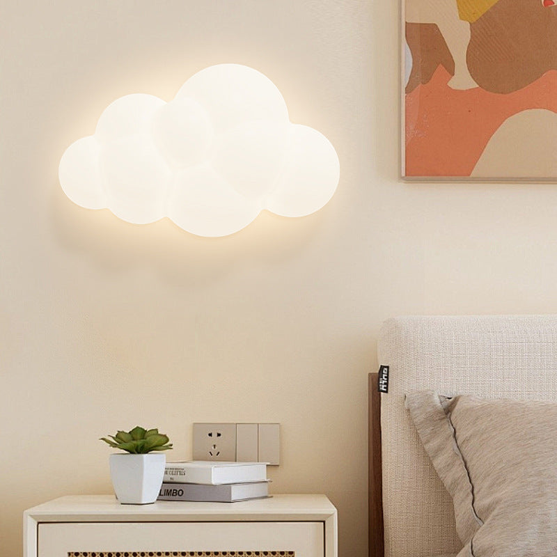 Contemporary Iron Cloud-Shaped LED Wall Sconce Lamp for Bedroom & Living Room  

Elevate your space with this stunning contemporary wall sconce featuring a unique cloud design. This iron LED lamp adds a modern touch to your bedroom or living room, creatin