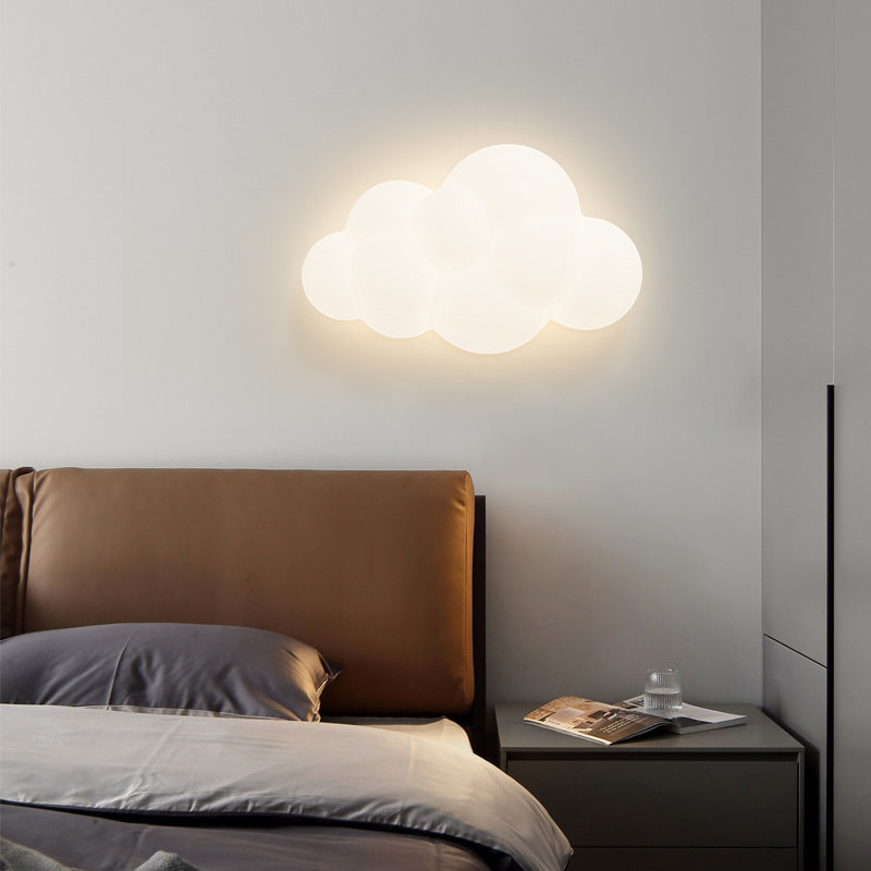 Contemporary Iron Cloud-Shaped LED Wall Sconce Lamp for Bedroom & Living Room  

Elevate your space with this stunning contemporary wall sconce featuring a unique cloud design. This iron LED lamp adds a modern touch to your bedroom or living room, creatin