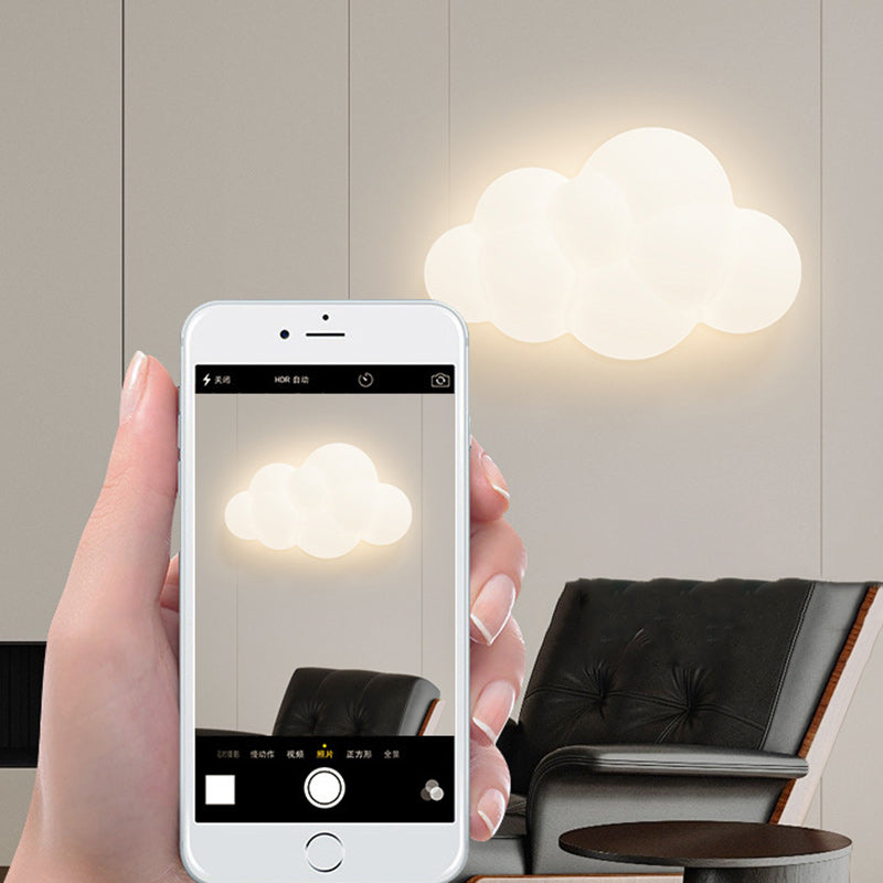 Contemporary Iron Cloud-Shaped LED Wall Sconce Lamp for Bedroom & Living Room  

Elevate your space with this stunning contemporary wall sconce featuring a unique cloud design. This iron LED lamp adds a modern touch to your bedroom or living room, creatin