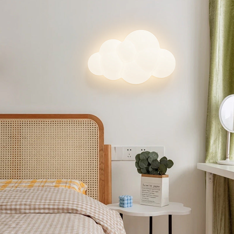 Contemporary Iron Cloud-Shaped LED Wall Sconce Lamp for Bedroom & Living Room  

Elevate your space with this stunning contemporary wall sconce featuring a unique cloud design. This iron LED lamp adds a modern touch to your bedroom or living room, creatin