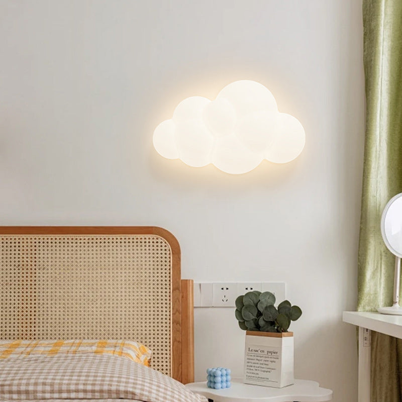Contemporary Iron Cloud-Shaped LED Wall Sconce Lamp for Bedroom & Living Room  

Elevate your space with this stunning contemporary wall sconce featuring a unique cloud design. This iron LED lamp adds a modern touch to your bedroom or living room, creatin