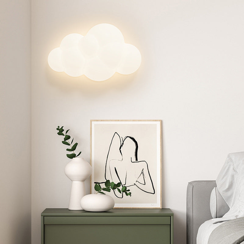 Contemporary Iron Cloud-Shaped LED Wall Sconce Lamp for Bedroom & Living Room  

Elevate your space with this stunning contemporary wall sconce featuring a unique cloud design. This iron LED lamp adds a modern touch to your bedroom or living room, creatin