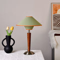Contemporary Scandinavian Flying Saucer Table Lamp - White Wax Wood for Bedroom 

Elevate your bedroom decor with this stylish and modern flying saucer-shaped table lamp. Crafted from premium white wax wood, it features a sleek design that complements con
