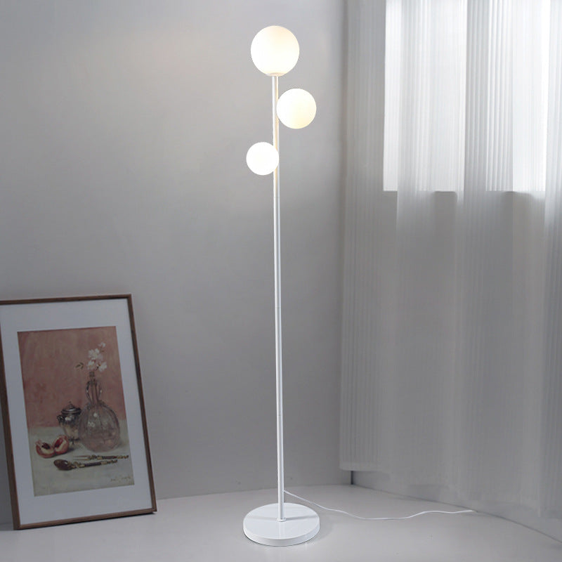Contemporary Round Ball Acrylic Iron 3-Light Floor Lamp for Bedroom  

Elevate your bedroom decor with this stylish contemporary floor lamp. Featuring a unique round ball design, sturdy iron construction, and beautiful acrylic accents, this 3-light standi