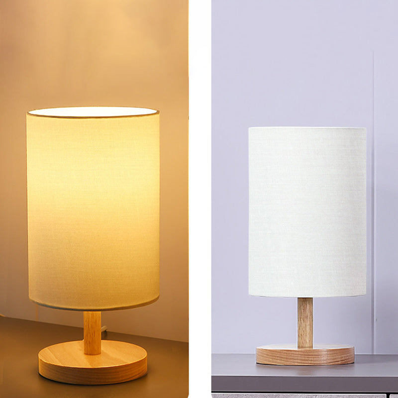 Traditional Japanese Cylinder Wood Table Lamp - 1-Light for Living Room

Illuminate your living space with this elegant Traditional Japanese Cylinder Wood Table Lamp. Designed with a unique cylindrical shape, this 1-light table lamp adds a touch of cultur