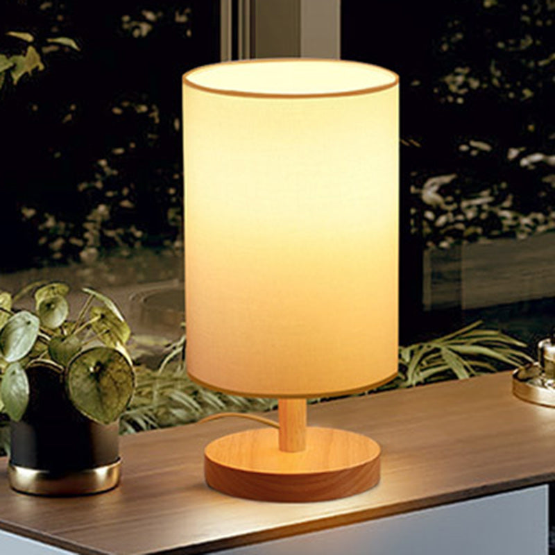 Traditional Japanese Cylinder Wood Table Lamp - 1-Light for Living Room

Illuminate your living space with this elegant Traditional Japanese Cylinder Wood Table Lamp. Designed with a unique cylindrical shape, this 1-light table lamp adds a touch of cultur