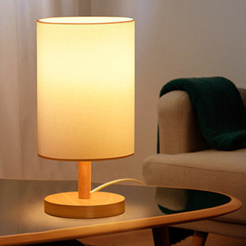 Traditional Japanese Cylinder Wood Table Lamp - 1-Light for Living Room

Illuminate your living space with this elegant Traditional Japanese Cylinder Wood Table Lamp. Designed with a unique cylindrical shape, this 1-light table lamp adds a touch of cultur