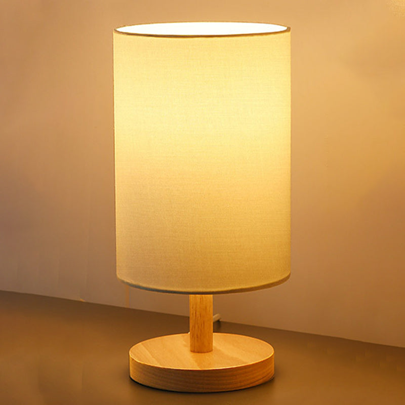 Traditional Japanese Cylinder Wood Table Lamp - 1-Light for Living Room

Illuminate your living space with this elegant Traditional Japanese Cylinder Wood Table Lamp. Designed with a unique cylindrical shape, this 1-light table lamp adds a touch of cultur