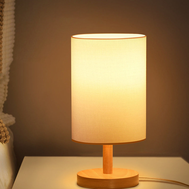 Traditional Japanese Cylinder Wood Table Lamp - 1-Light for Living Room

Illuminate your living space with this elegant Traditional Japanese Cylinder Wood Table Lamp. Designed with a unique cylindrical shape, this 1-light table lamp adds a touch of cultur