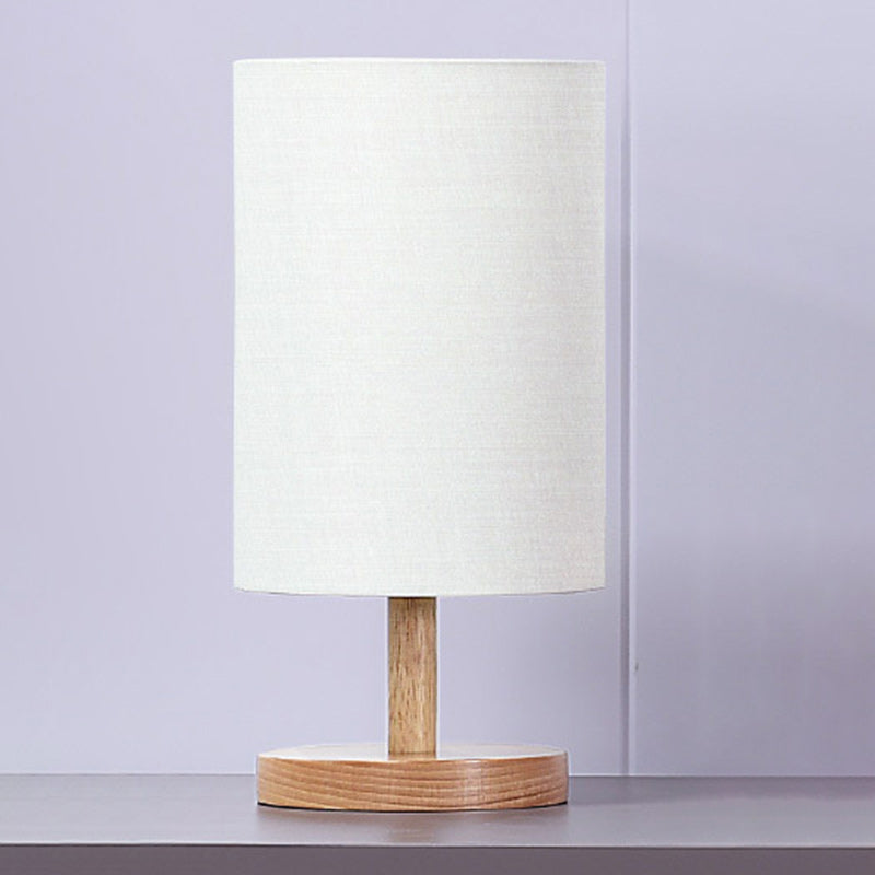 Traditional Japanese Cylinder Wood Table Lamp - 1-Light for Living Room

Illuminate your living space with this elegant Traditional Japanese Cylinder Wood Table Lamp. Designed with a unique cylindrical shape, this 1-light table lamp adds a touch of cultur