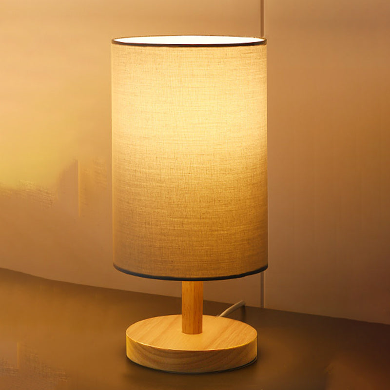 Traditional Japanese Cylinder Wood Table Lamp - 1-Light for Living Room

Illuminate your living space with this elegant Traditional Japanese Cylinder Wood Table Lamp. Designed with a unique cylindrical shape, this 1-light table lamp adds a touch of cultur
