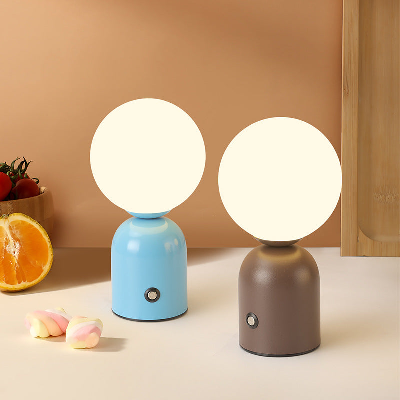 Contemporary Scandinavian Globe Iron Acrylic LED Table Lamp for Living Room  

Elevate your living space with this stylish Scandinavian-inspired table lamp. Featuring a sleek globe design, this lamp combines durable iron and elegant acrylic to create a mo