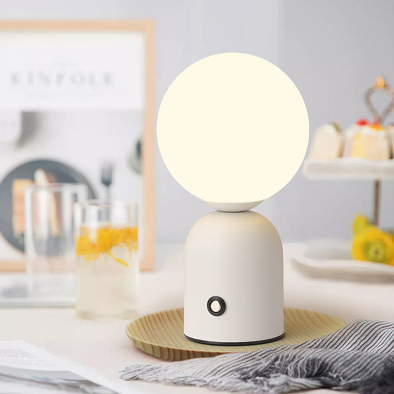 Contemporary Scandinavian Globe Iron Acrylic LED Table Lamp for Living Room  

Elevate your living space with this stylish Scandinavian-inspired table lamp. Featuring a sleek globe design, this lamp combines durable iron and elegant acrylic to create a mo