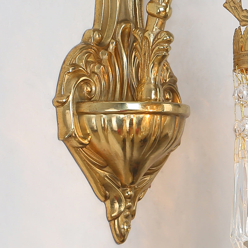 Traditional French Teardrop Copper Crystal Wall Sconce Lamp 

Illuminate your living room with this stunning traditional French teardrop wall sconce. Crafted from high-quality copper and adorned with exquisite crystal accents, this 1/2-light lamp adds a t