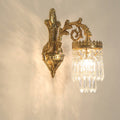 Traditional French Teardrop Copper Crystal Wall Sconce Lamp 

Illuminate your living room with this stunning traditional French teardrop wall sconce. Crafted from high-quality copper and adorned with exquisite crystal accents, this 1/2-light lamp adds a t