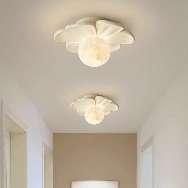 Contemporary Floral Cream Semi-Flush Mount Light for Hallway  

Elevate your hallway with this stunning contemporary cream floral ball semi-flush mount light. Crafted from durable iron and resin, its elegant design showcases a beautiful floral pattern, ad