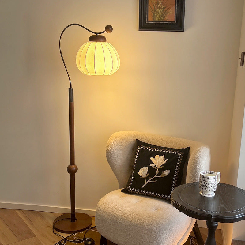 Traditional Vintage Pumpkin Cylinder Bent Sphere Floor Lamp - Wood & Aluminum 1-Light for Living Room  

Illuminate your living space with this stylish Traditional Vintage Pumpkin Cylinder Bent Sphere Floor Lamp. Crafted with a blend of wood and aluminum,