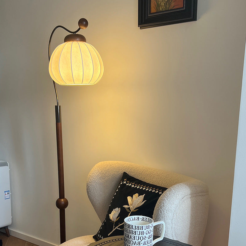Traditional Vintage Pumpkin Cylinder Bent Sphere Floor Lamp - Wood & Aluminum 1-Light for Living Room  

Illuminate your living space with this stylish Traditional Vintage Pumpkin Cylinder Bent Sphere Floor Lamp. Crafted with a blend of wood and aluminum,