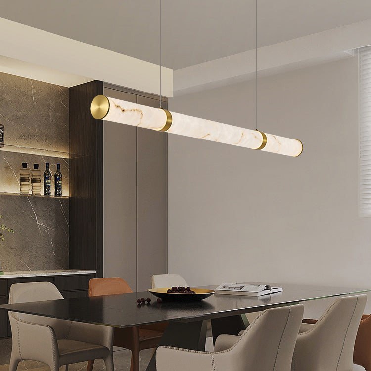 Modern Luxury Textured Iron LED Pendant Light for Dining Room  

Elevate your dining experience with our Modern Luxury Cylinder Long Textured Iron Faux Dolomite LED Pendant Light. This stunning island light features a contemporary cylindrical design, perf