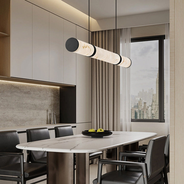 Modern Luxury Textured Iron LED Pendant Light for Dining Room  

Elevate your dining experience with our Modern Luxury Cylinder Long Textured Iron Faux Dolomite LED Pendant Light. This stunning island light features a contemporary cylindrical design, perf